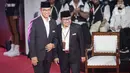 Debat perdana calon presiden 2024 mengusung tema Hukum, Hak Asasi Manusia (HAM), Pemberantasan Korupsi, dan Penguatan Demokrasi. (Liputan6.com/Faizal Fanani)