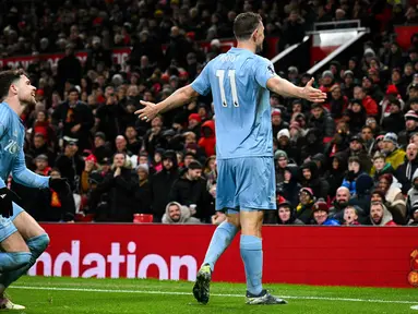 Manchester United (MU) asuhan Ruben Amorim meraih hasil buruk ketika menjamu Nottingham Forest di ajang Liga Inggris 2024/2025 hari Minggu (08/12/2024) dini hari WIB. (AFP/Oli Scarff)