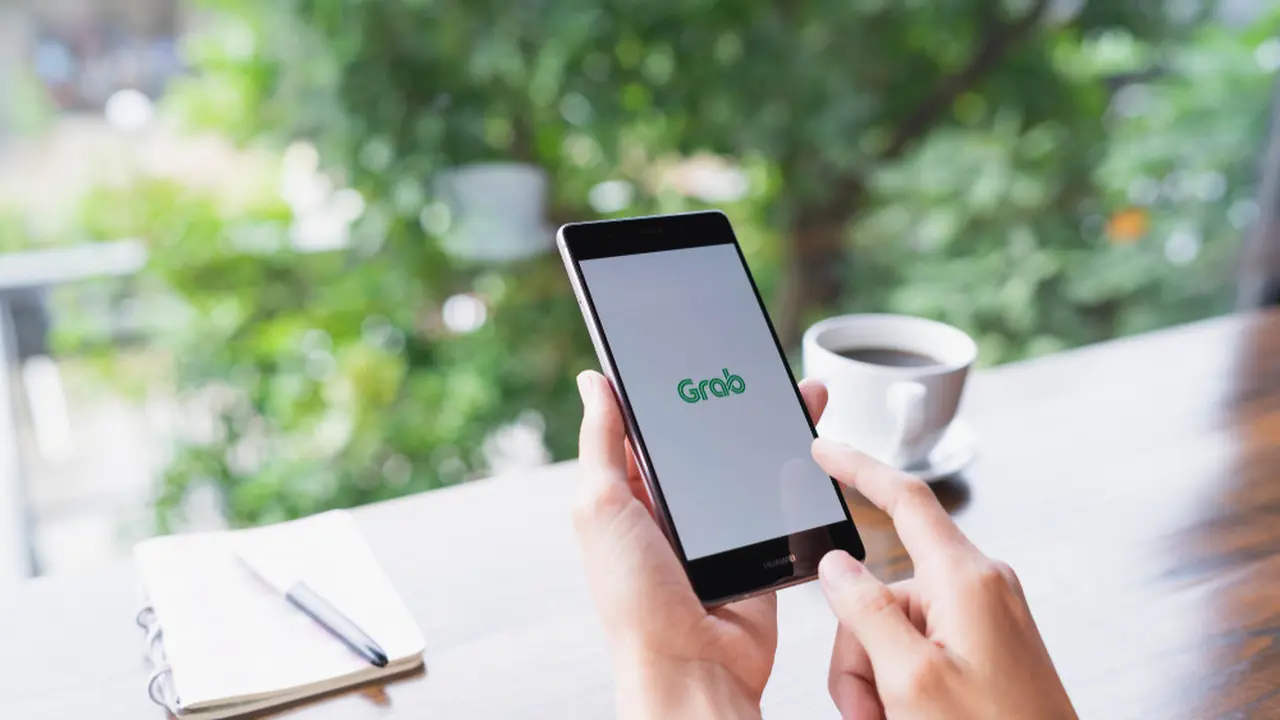 Pacar Batal Jemput Naik Saja Layanan Grab yang Kini Jadi Decacorn