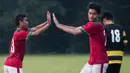 Striker Indonesia U-19, Muhammad Rafli, merayakan gol yang dicetaknya ke gawang PPLM pada laga ujicoba di Lapangan NYTC Sawangan, Depok, Jawa Barat, Jumat (5/8/2016). Indonesia U-19 menang 3-0 atas PPLM. (Bola.com/Vitalis Yogi Trisna)