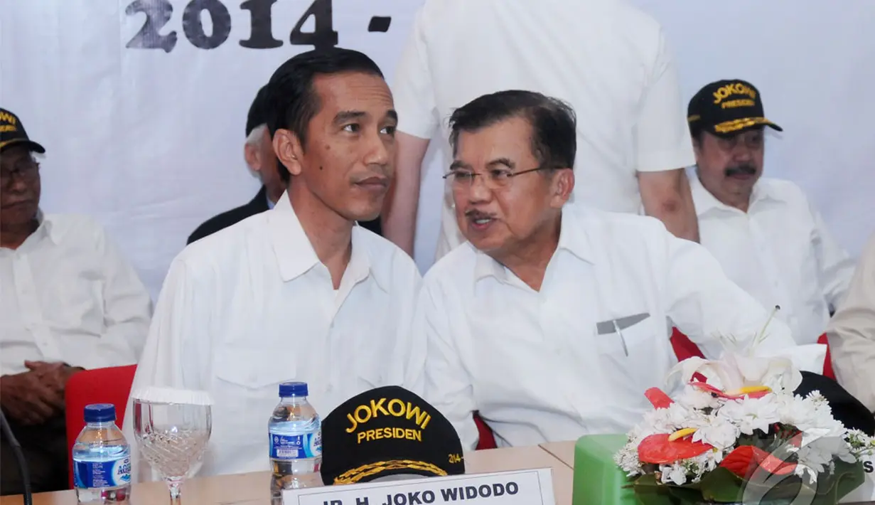 Jokowi dan Jusuf Kalla menghadiri jumpa pers terkait dukungan PKPI terhadap pencalonan mereka di Menteng, Jakarta Pusat, Kamis (22/5/2014) (Liputan6.com/Andrian M Tunay).