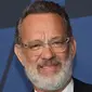 Tom Hanks tiba menghadiri gala Penghargaan Gubernur Tahunan ke-11 yang diselenggarakan Academy of Motion Picture Arts and Sciences di Hollywood 27 Oktober 2019. Hanks (63) mengatakan dia dan Wilson menderita demam saat berada di Australia, dan sekarang akan diisolasi dan diawasi. (AFP/Chris Delmas)