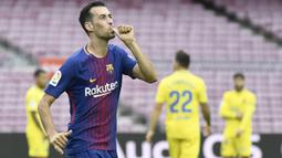 Sergio Busquets menjalin kontrak dengan Barcelona hingga 30 juni 2021 dan menerima gaji sebesar 180.000 pound sterling per minggu. (AFP/Jose Jordan)