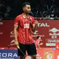 Pebulutangkis tunggal putra Indonesia, Tommy Sugiarto mengepalkan tangan saat berlaga melawan Pablo Abian (Spanyol) di Total BWF World Championships 2015 di Jakarta, Senin (10/8/2015). Tommy unggul 21-16, 21-13. (Liputan6.com/Helmi Fithriansyah)