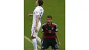 Ekspresi pemain depan Timnas Jerman, Thomas Mueller (kanan) usai menjebol gawang AS di laga penutup penyisihan Piala Dunia 2014 Grup G di Stadion Pernambuco, Recife, Brasil, (26/6/2014). (REUTERS/Ruben Sprich)