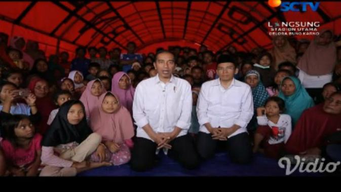 Presiden Jokowi menyampaikan sambutan penutupan Asian Games di tengah pengungsi gempa Lombok, NTB
