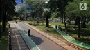 Kondisi lalu lintas di Taman Semanggi, Jakarta, Rabu (12/10/2022). Gubernur DKI Jakarta Anies Baswedan menyatakan pembangunan fasilitas pejalan kaki dan jalur sepeda di Taman Semanggi bertujuan untuk memberikan ruang interaksi dan oase baru bagi warga Ibu Kota dan sekitarnya. (Liputan6.com/Herman Zakharia)
