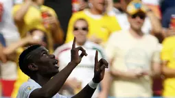 Pemain tengah Timnas Perancis, Paul Pogba, merayakan golnya ke gawang Nigeria saat berlaga 16 besar Piala Dunia 2014 di Stadion Nasional Brasilia, (30/6/2014). (REUTERS/Jorge Silva) 