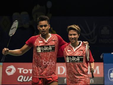 Ganda campuran Indonesia, Tontowi Ahmad/Liliyana Natsir, berhasil mengalahkan pasangan Malaysia, Chan Peng Soon/Peck Yen Wei, pada semifinal Indonesia Open di JCC, Jakarta, Sabtu (17/6/2017). (Bola.com/Vitalis Yogi Trisna)