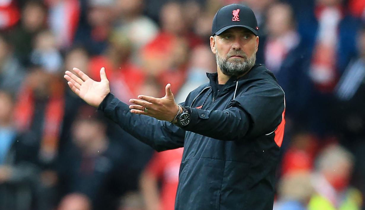 Jurgen Klopp tercatat telah berhasil mempersembahkan empat gelar bagi Liverpool, yaitu Liga Inggris, Liga Champions, Piala Super Eropa, dan Piala Dunia Antarklub. Selama bekerja di Anfield, Klopp mendapatkan bayaran sebesar 15 juta pounds. (AFP/Lindsey Parnaby)