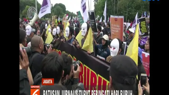 Ratusan Jurnalis Suarakan Perjuangan Buruh dan Pekerja Media di Silang Monas