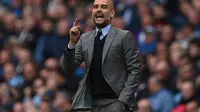 Pep Guardiola optimistis Manchester City akan bermain di Liga Champions musim mendatang. (AFP/Oli Scarff)