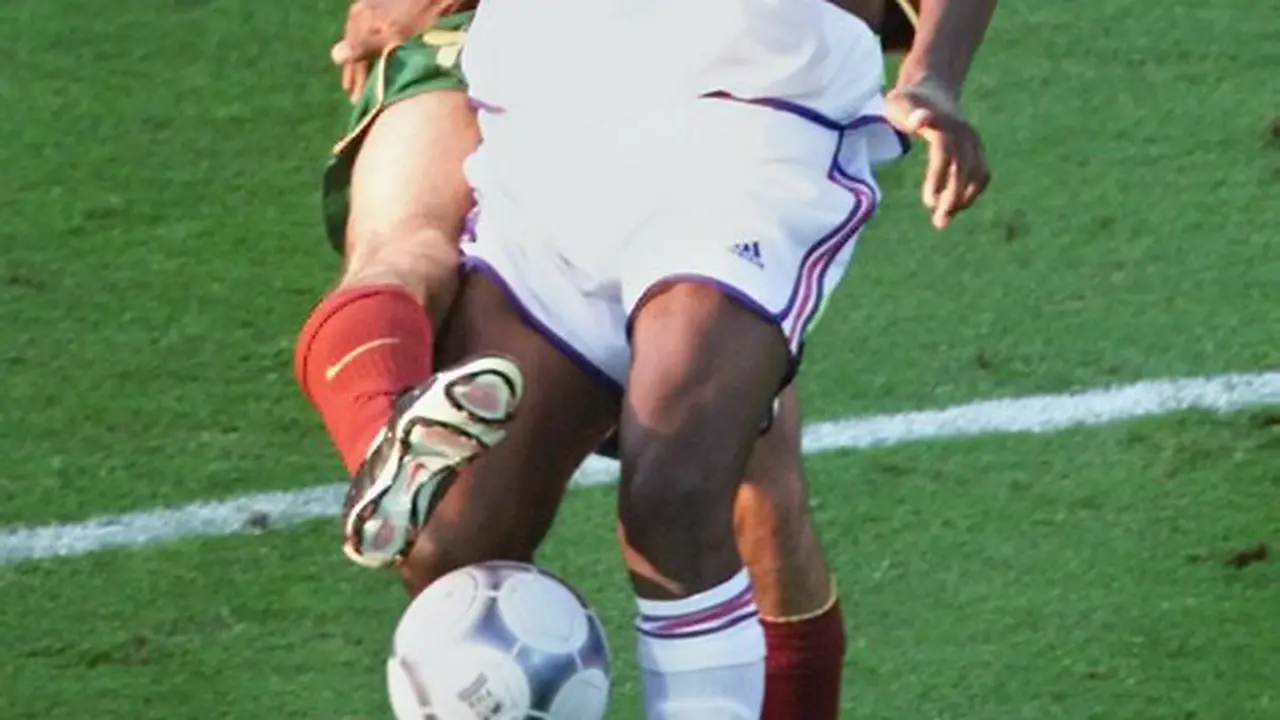 Patrick Vieira dan Luis Figo