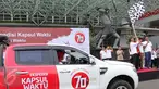 Mensesneg Praktikno melepas keberangkatan mobil Ekspedisi Kapsul Waktu di Gelora Bung Karno, Jakarta, Kamis (17/9). Mobil tersebut akan melakukan perjalanan keliling Indonesia guna mewujudkan mimpi melalui aspirasi masyarakat. (Liputan6.com/Angga Yuniar)