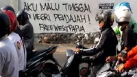 Coretan vandalisme menyuarakan kemerdekaan Papua Barat marak di Solo. (Solopos.com/ Nicolous Irawan)
