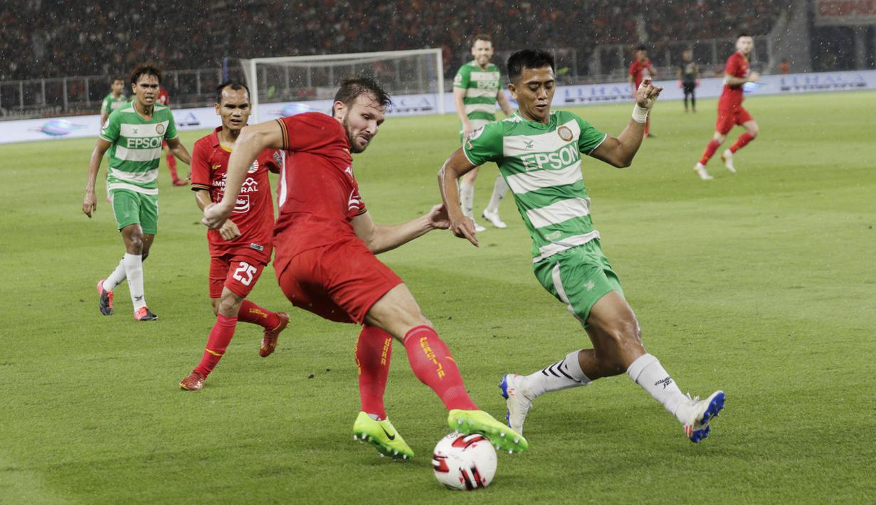 Sepanjang pertandingan, Marco Motta tampil tenang dan disiplin dalam mengawal lini pertahanan skuat Macan Kemayoran. (Bola.com/M Iqbal Ichsan)