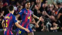 Pemain Barcelona, Marcus Rashford, merayakan gol pembuka dalam pertandingan Liga Spanyol melawan Real Madrid di Camp Nou, Spanyol, Senin (11/5/2026) dini hari WIB. (AP Photo/Joan Mateu Parra)