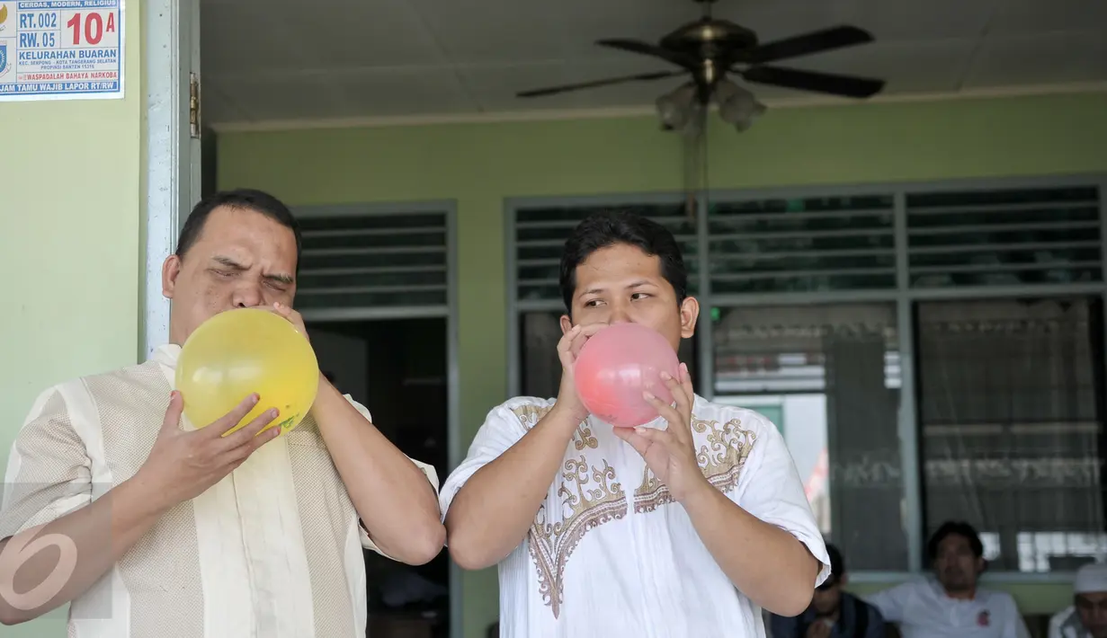 Meski indera melihat mereka tidak sempurna, namun mereka tetap menikmati perayaan kemerdekaan dengan segala keterbatasan dan bangga menjadi Indonesia. (Liputan6.com/Yoppy Renato)