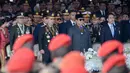 Presiden Prabowo Subianto memimpin sekaligus menjadi inspektur upacara Hari Ulang Tahun (HUT) ke-79 Bhayangkara yang diselenggarakan di Lapangan Monumen Nasional (Monas), Jakarta Pusat, pada Selasa 1 Juli 2025. (BAY ISMOYO/AFP)