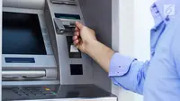 Ilustrasi Foto Mesin  ATM (Anjungan Tunai Mandiri) (iStockphoto)