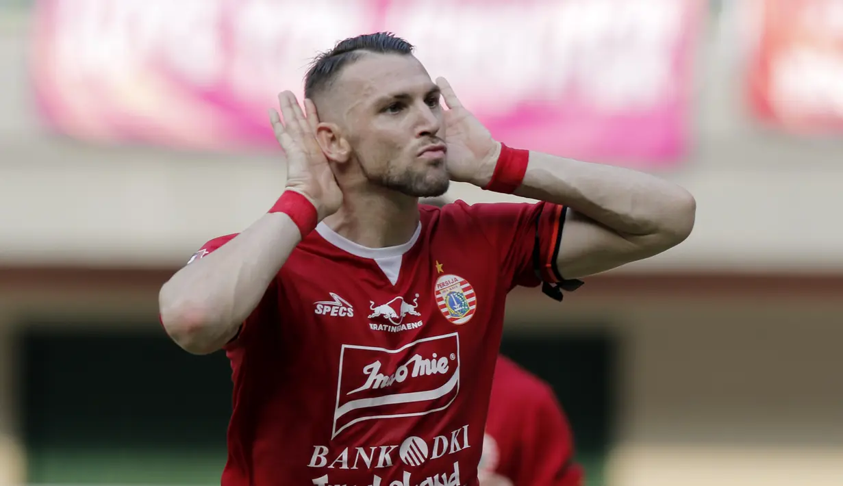 Striker Persija Jakarta, Marko Simic merayakan selebrasi setelah menjebol gawang PSIS Semarang di Stadion Patriot Candrabhaga, Kota Bekasi, Minggu (15/9/2019). (Bola.com/Muhammad Iqbal Ichsan)