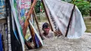Sejumlah wilayah di kota Makassar, Sulawesi Selatan dilanda banjir besar usai dilanda hujan lebat selama tiga hari terakhir. (DAENG MANSUR/AFP)