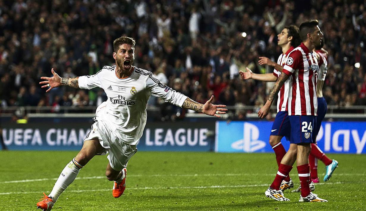 Bek Real Madrid, Sergio Ramos, merayakan gol penyeimbnag yang dicetaknya ke gawang Atletico Madrid pada laga final Liga Champions di Stadion Luz, Portugal, Sabtu (24/5/2014). (EPA/Jose Sena Goulao)