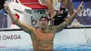 Di nomor individu, Caeleb Dressel meraih medali emas pada nomor 100 meter gaya bebas, 100 meter gaya kupu-kupu dan 50 meter gaya bebas. Untuk nomor 100 meter gaya kupu-kupu ia memecahkan rekor dunia, sedangkan dua nomor lainnya berhasil memecahkan rekor Olimpiade. (Foto: AP/Martin Meissner)