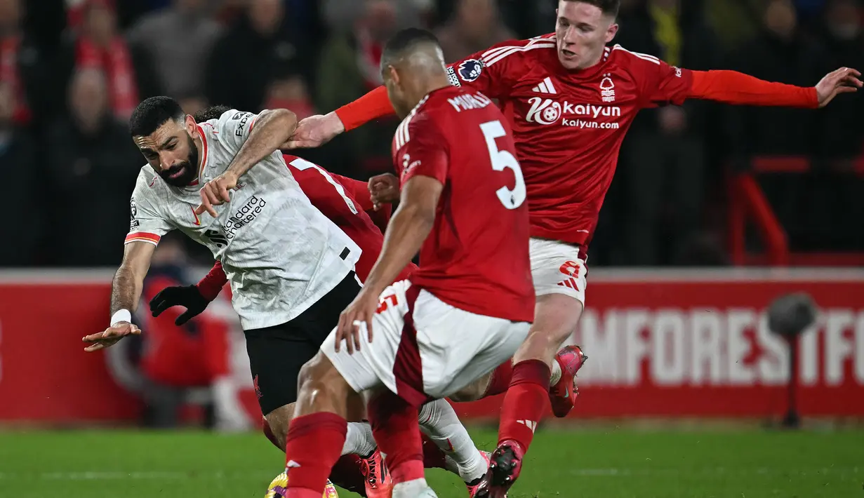 Laga lanjutan Liga Premier Inggris 2024/2025 antara Nottingham Forest dan Liverpool berakhir imbang 1-1. (Paul ELLIS/AFP)
