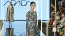 Model mengenakan busana desainer Araida dari Rusia dalam Jakarta Modest Fashion Week di Gandaria City, Jakarta, Kamis (26/7). Ajang fashion bergengsi ini diselenggarakan mulai 26-29 Juli 2018. (Liputan6.com/Faizal Fanani)