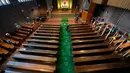 <p>Gereja Evangelis Emaus dihiasi dengan karpet hijau bergambar lapangan sepak bola di Gelsenkirchen, Jerman, Minggu, 23 Juni 2024. (AP Photo/Alessandra Tarantino)</p>