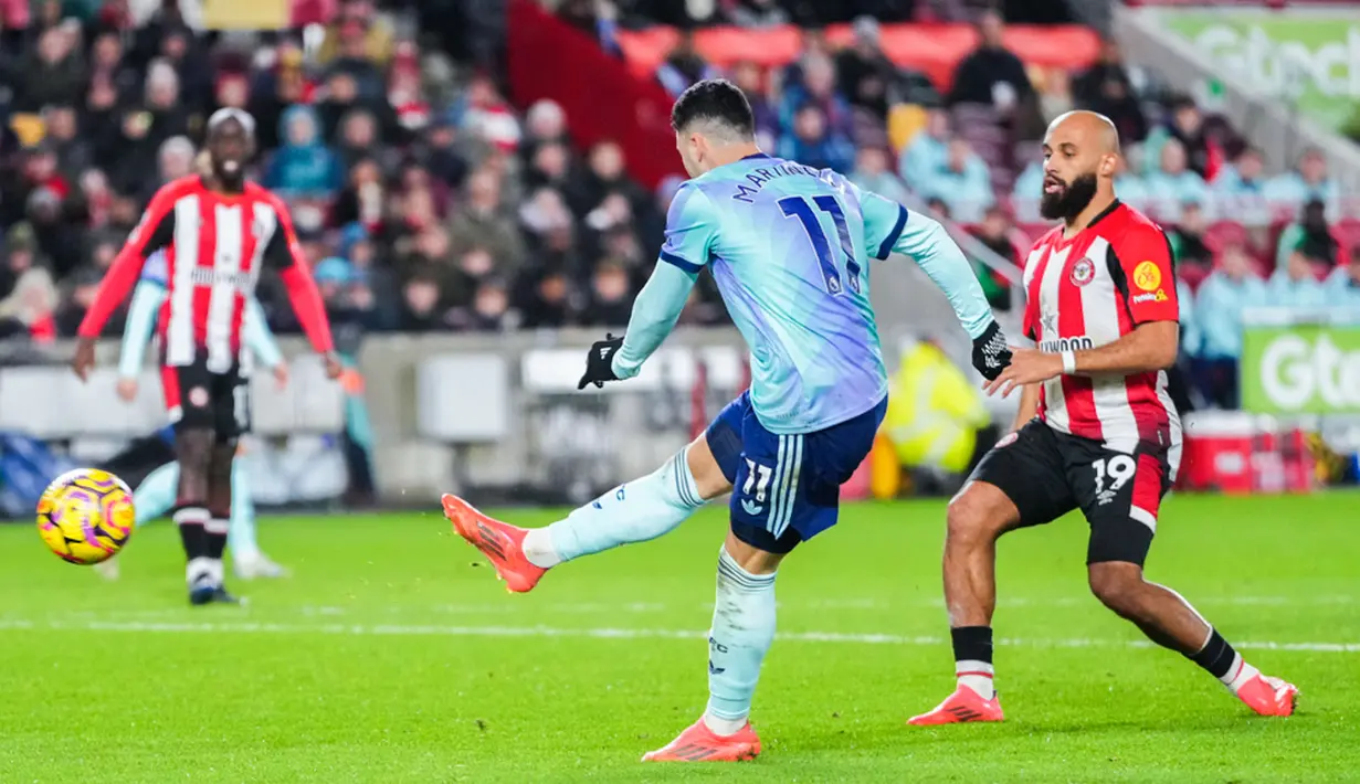 Selain itu, tim asuhan Mikel Arteta mampu melepaskan 14 tembakan dengan 5 di antaranya mengarah tepat ke gawang Brentford. (AP Photo/Kirsty Wigglesworth)