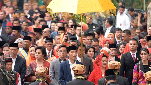 [Bintang] Jokowi dan Iriana Medan