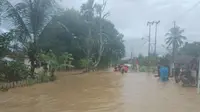 Banjir melanda wilayah Kabupaten Bolaang Mongondow akibat&nbsp;cuaca ekstrem hujan dengan intensitas tinggi yang terjadi sejak kemarin hingga hari ini. (Liputan6.com/ Dok BPBD Bolaang Mongondow)