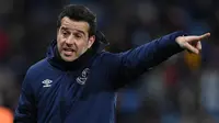 Marco Silva. Pelatih asal Portugal berusia 44 tahun ini telah menangani 3 klub EPL, yaitu Hull City, Watford dan Everton. Prestasi terbaiknya dalah membawa Everton finish di posisi 8 pada musim debutnya 2018/2019. Musim 2021/2022 ini ia menangani Fulham di Championship. (AFP/Oli Scarff)