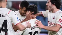 AC Milan menumbangkan Genoa dengan skor 3-1 dalam 16 besar Coppa Italia 2021/2022, San Siro, Jumat (14/1/2022). (AFP/Marco Bertorello)