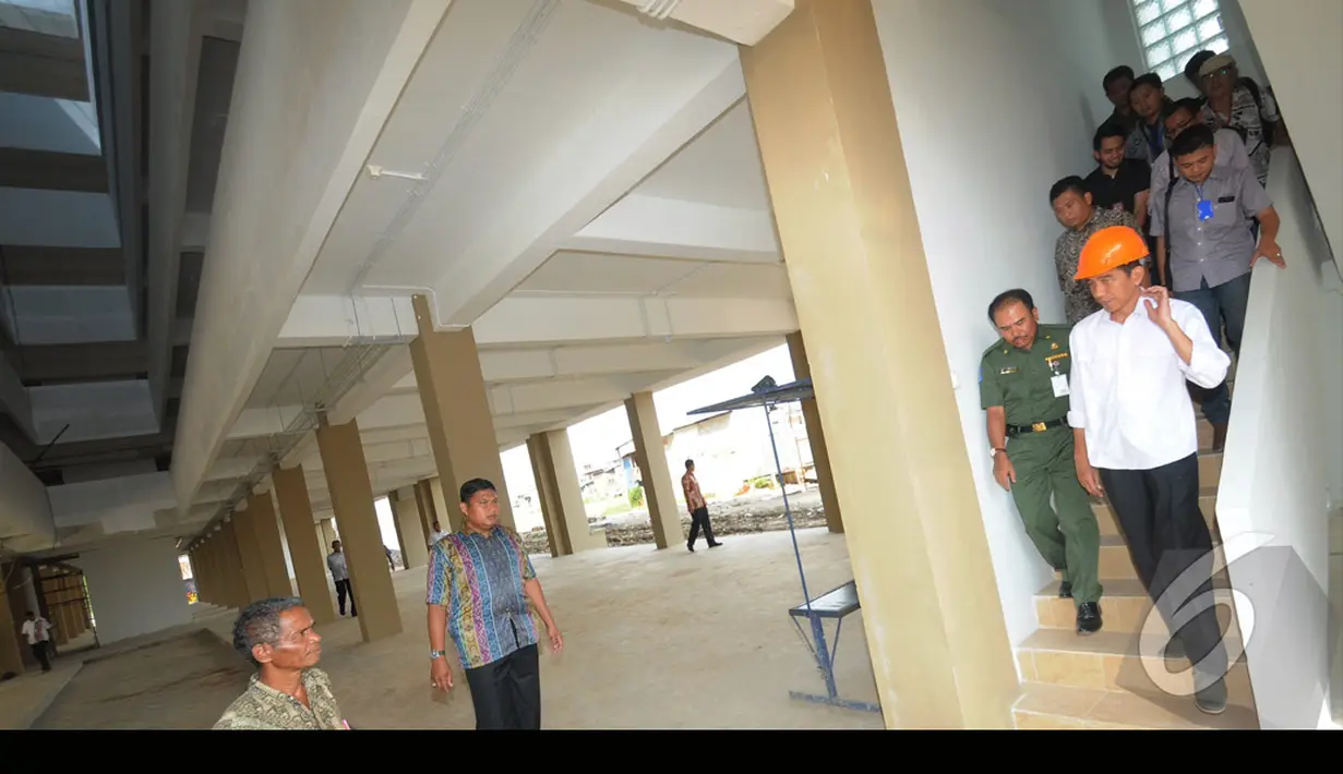 Jokowi mengatakan bahwa Rusun Muara Baru mulai bisa ditempati pada September 2014, Jakarta Utara, Senin (4/8/2014) (Liputan6.com/Herman Zakharia)