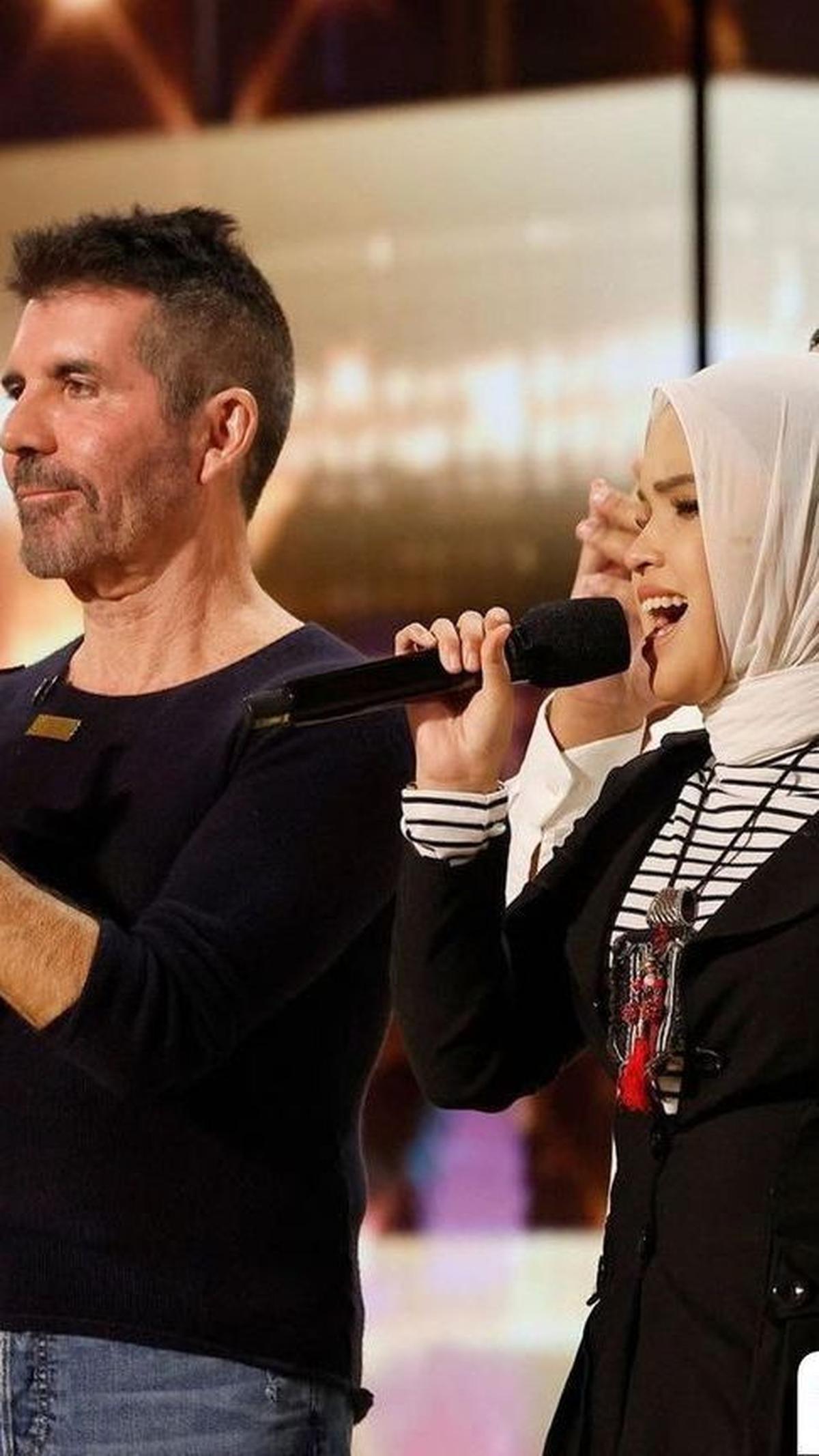 Simon Cowell sempat membocorkan bahwa dalam dalam result show nanti Putri akan berduet dengan seseorang.<br>