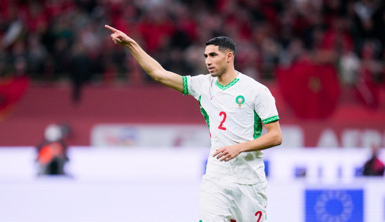 Pemain Maroko, Achraf Hakimi, merayakan kemenangan atas Zambia pada laga Piala Afrika di Prince Moulay Abdellah Stadium, Selasa (30/12/2025). (AP Photo/Themba Hadebe)