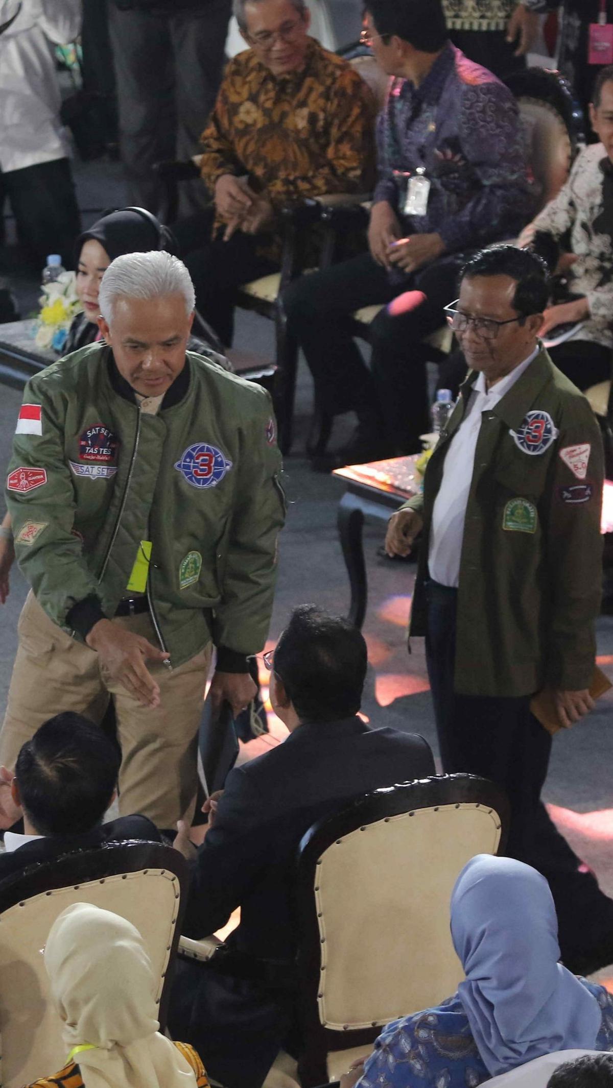 Kemudian pasangan capres-cawapres nomor urut 3, Ganjar Pranowo dan Mahfud MD tiba.<br>Foto Liputan6.com / Angga Yanuar<br>