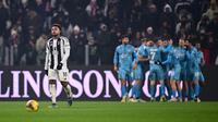 Gelandang Juventus asal Amerika Serikat bernomor punggung 16, Weston McKennie, bereaksi selama pertandingan Seri A Italia antara Juventus FC dan Venezia FC di Stadion Allianz di Turin, Minggu dini hari WIB (15/12/2024). (MARCO BERTORELLO/AFP)