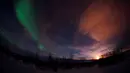 Aurora Borealis menerangi langit saat malam hari di Kautokeino, Norwegia, Rabu (15/3). Aurora Borealis sering juga disebut The Northern Lights. (AFP PHOTO / Jonathan NACKSTRAND)