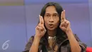 Aming berjanji akan mencari orang yang berani mengatakan ucapan tidak pantas kepada istrinya, Jakarta, Kamis (8/9).   (Liputan6.com/Herman Zakharia)