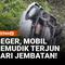 Sebuah mobil pemudik terjun dari Jembatan Medangan di Jalan Raya Desa Metatu, Kecamatan Benjeng, Kabupaten Gresik, Selasa sore. Kecelakaan terjadi saat pengemudi berusaha menghindari sepeda motor yang datang dari arah berlawanan, mengakibatkan kendar...