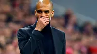 Kekecewaan juga tidak bisa disembunyikan dari raut wajah pelatih Bayern Munich, Josep Guardiola, pasca dipermalukan Real Madrid 0-4 di Allianz Arena, (30/4/2014). (REUTERS/Kai Pfaffenbach)