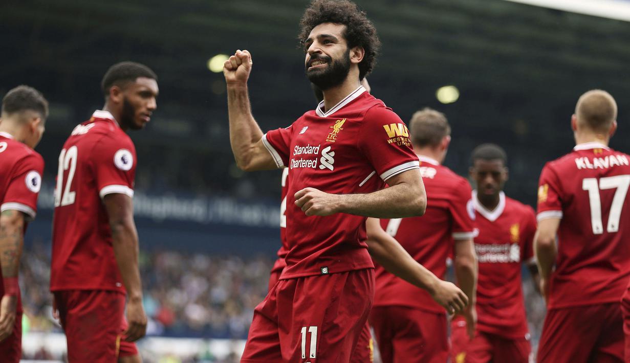 Selebrasi pemain Liverpool, Mohamed Salah usai mencetak gol ke gawang West Bromwich pada lanjutan Premier League di The Hawthorns, West Bromwich, (21/4/2018).  West Bromwich imbangi Liverpool 2-2. (Nigel French/PA via AP)