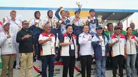 Ketua Umum PSSI, Erick Thohir, stelah prosesi pengalungan medali cabor sepak bola putri PON 2024 di Aceh-Sumatra Utara, Sabtu (14/9/2024). (Bola.com/Aditya Wany)