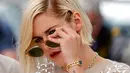 Aktris Kristen Stewart tampil gaya menggunakan kacamata hitam saat sesi pemotretan untuk film " Personal Shopper" dalam kompetisi di Festival Film Cannes ke-69 di Cannes, Prancis, 17 Mei 2016. (REUTERS / Jean-Paul Pelissier)