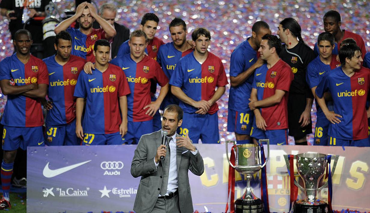 5. Pada musim pertamanya Josep Guardiola berhasil mempersembahkan treble (La Liga, Copa Del Rey dan Piala Champions). Debut yang sensasional bagi seorang pelatih baru. (AFP/Lluis Gene)