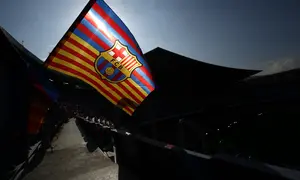 Logo dan ilustrasi Barcelona. (AFP/Pau Barrena)